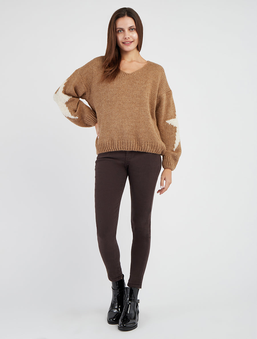 Maglione in maglia tinta unita con motivi a stelle. - Chameau