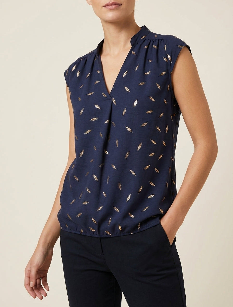 Top elasticizzato con stampa di piume iridescenti. - Marina