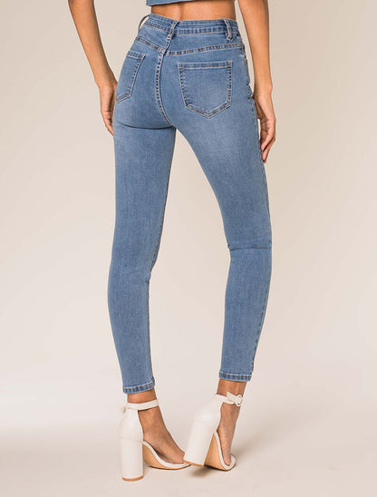 Jean 7/8 a bordi effetto ritagli. - blu denim