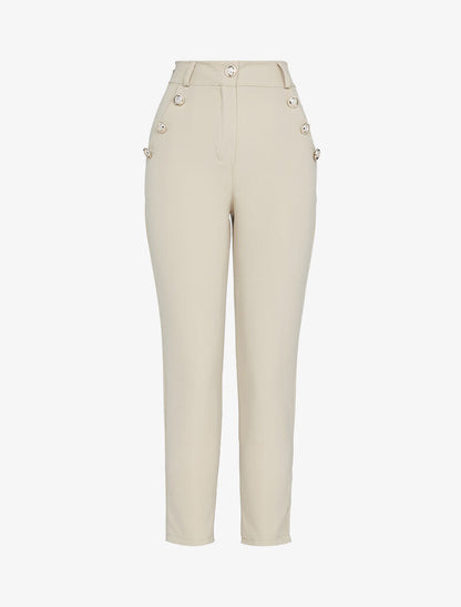 Pantaloni 7/8 con bottoni decorativi. - beige