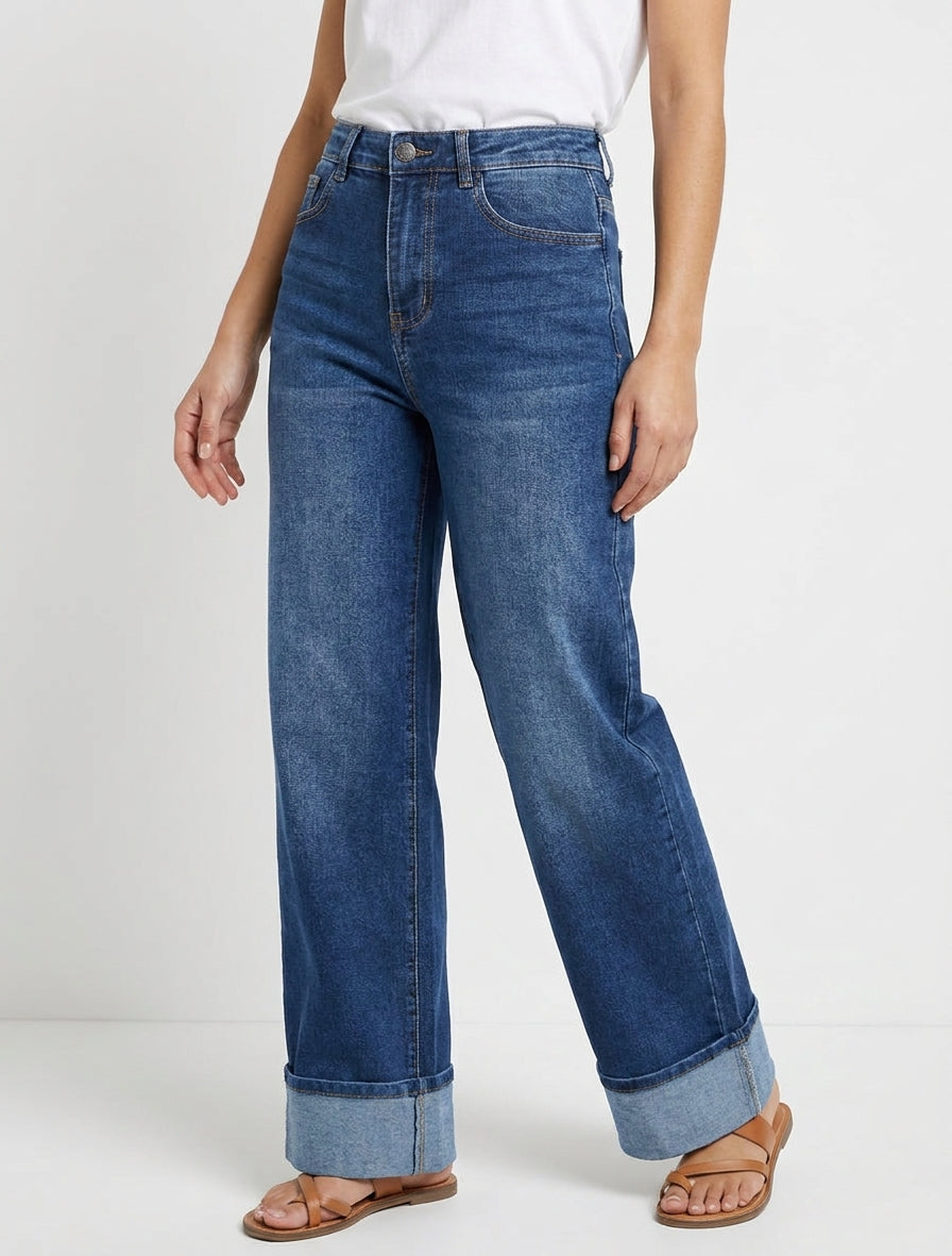 Jean a gamba larga délavé con orlo. - Blu denim