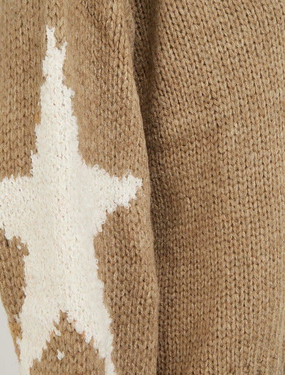 Maglione in maglia tinta unita con motivi a stelle. - Chameau