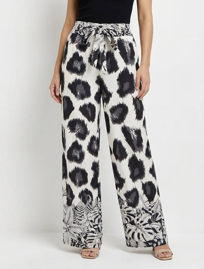 Pantaloni ampi con stampa leopardata fantasia - Nero