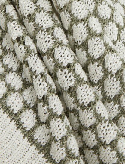 Pull sans manches motif nid d&