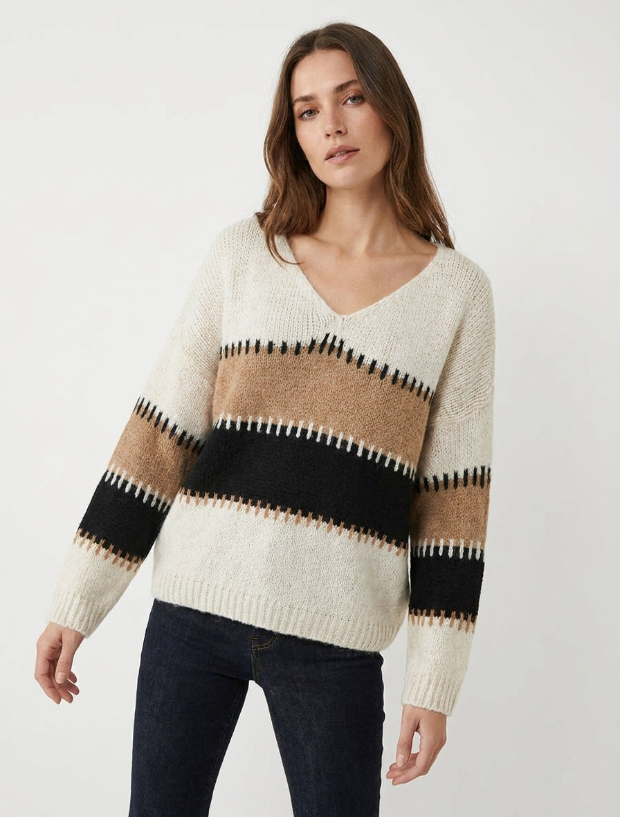 Maglione ampio con scollo a V e righe stilizzate. - Beige